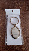 Elegant Oval Shape Metal Keychain for Personal Use